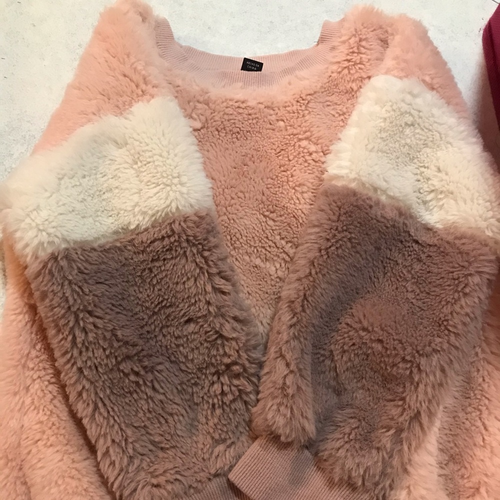 Super soft long sleeve sweater.